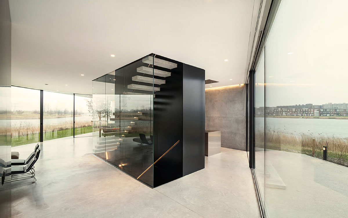 A Sleek and Bright Contemporary Home Surrounded by Water with Spectacular Views in Amsterdam by Studioninedots (5)