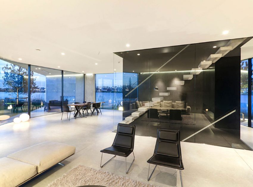 A Sleek and Bright Contemporary Home Surrounded by Water with Spectacular Views in Amsterdam by Studioninedots (7)