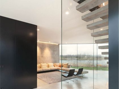 A Sleek and Bright Contemporary Home Surrounded by Water with Spectacular Views in Amsterdam by Studioninedots (8)