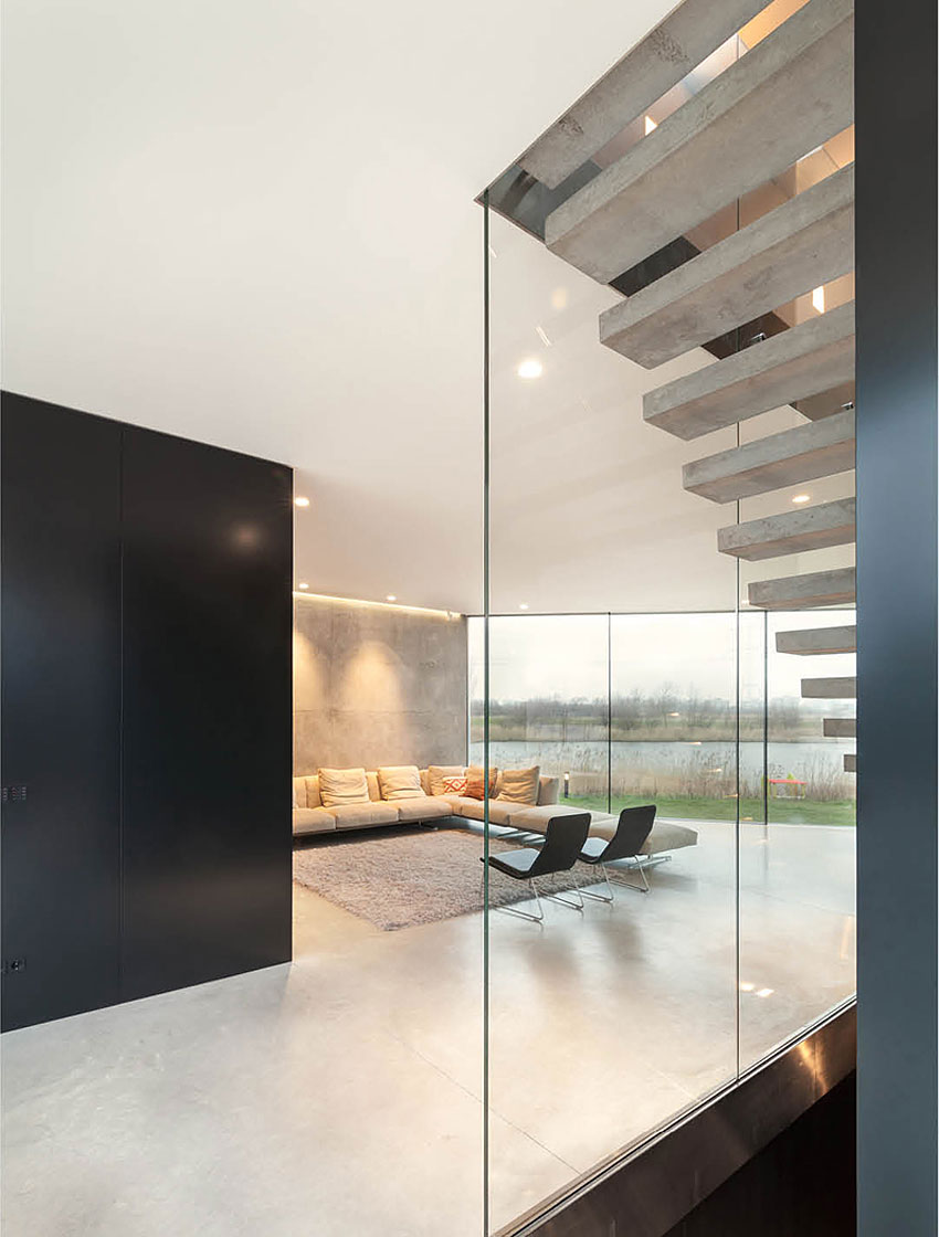 A Sleek and Bright Contemporary Home Surrounded by Water with Spectacular Views in Amsterdam by Studioninedots (8)