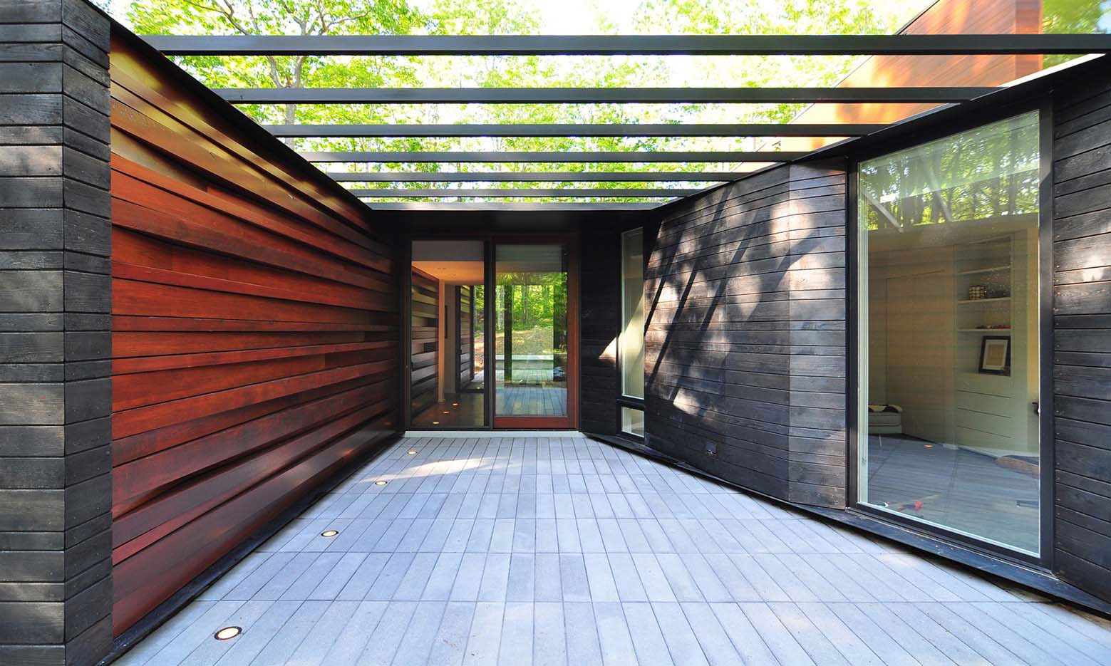 A Small Contemporary Home Nestled in a Nature Forest on the Shores of Lake Michigan by Johnsen Schmaling Architects (2)