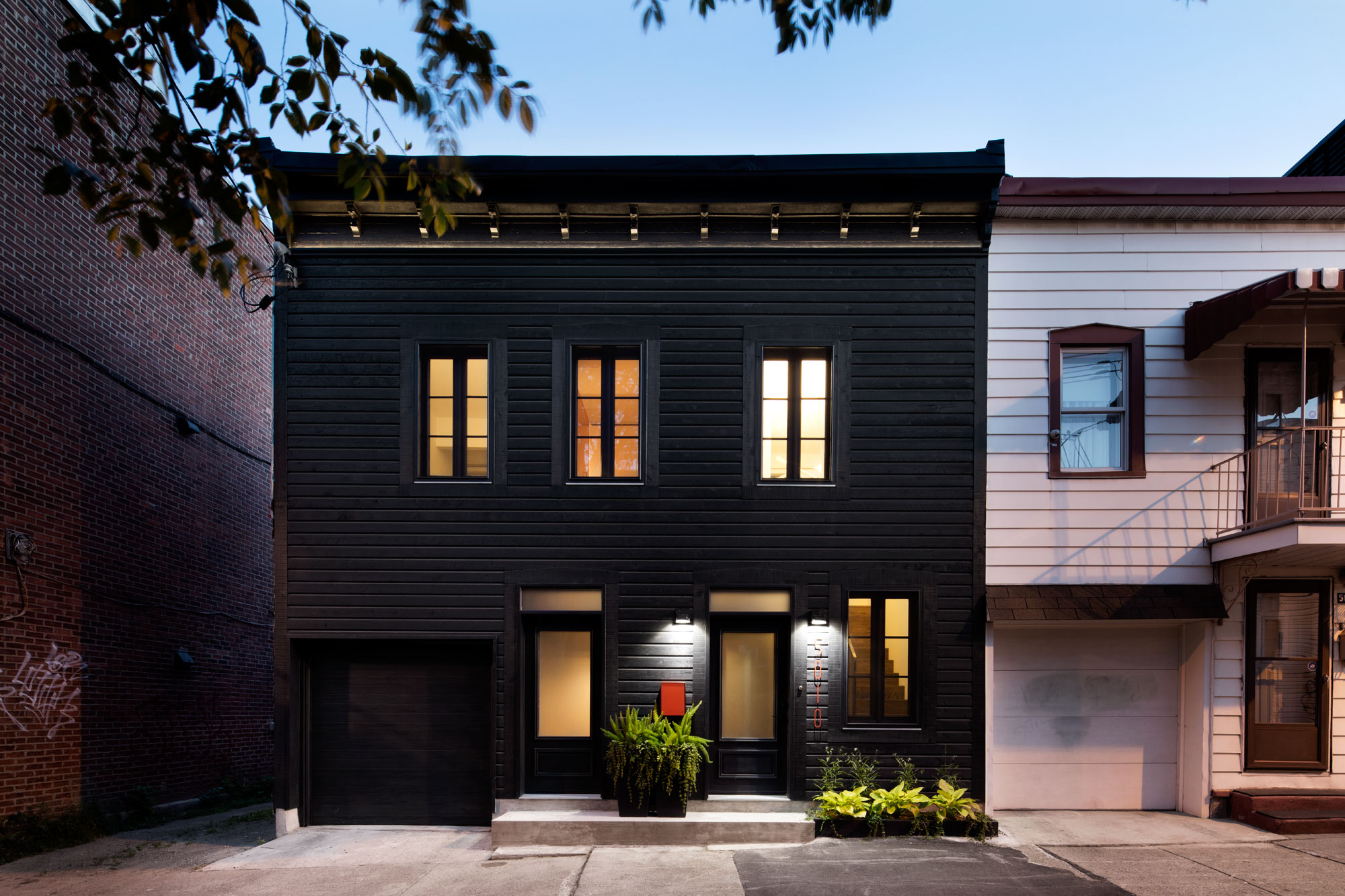 A Small Contemporary House with Bold Black Facade in Montréal by Architecture Open Form (2)