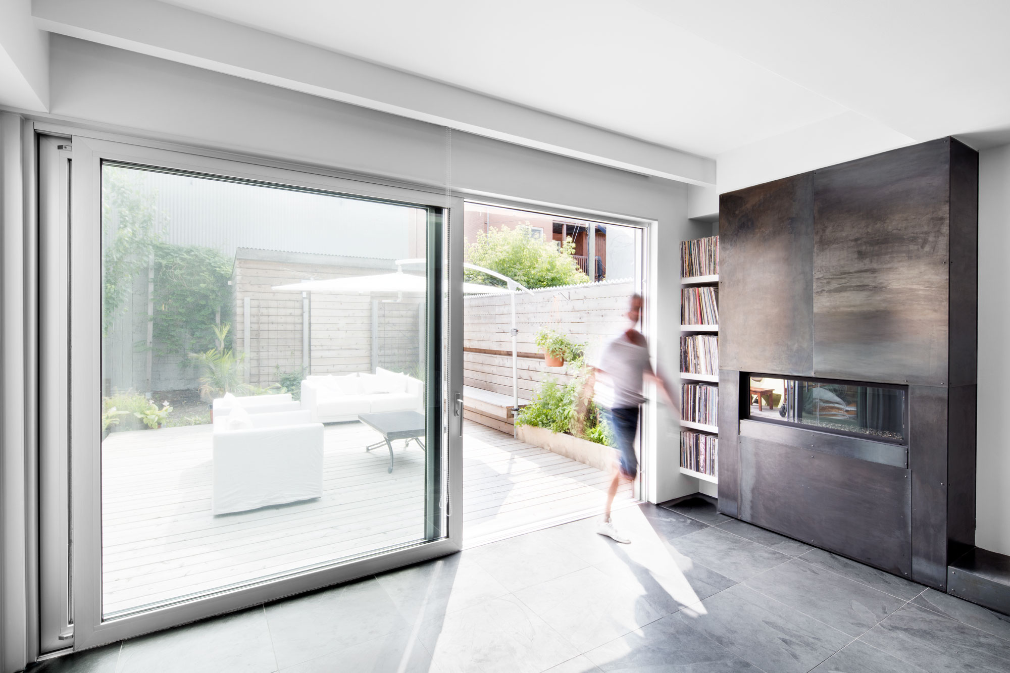 A Small Contemporary House with Bold Black Facade in Montréal by Architecture Open Form (3)