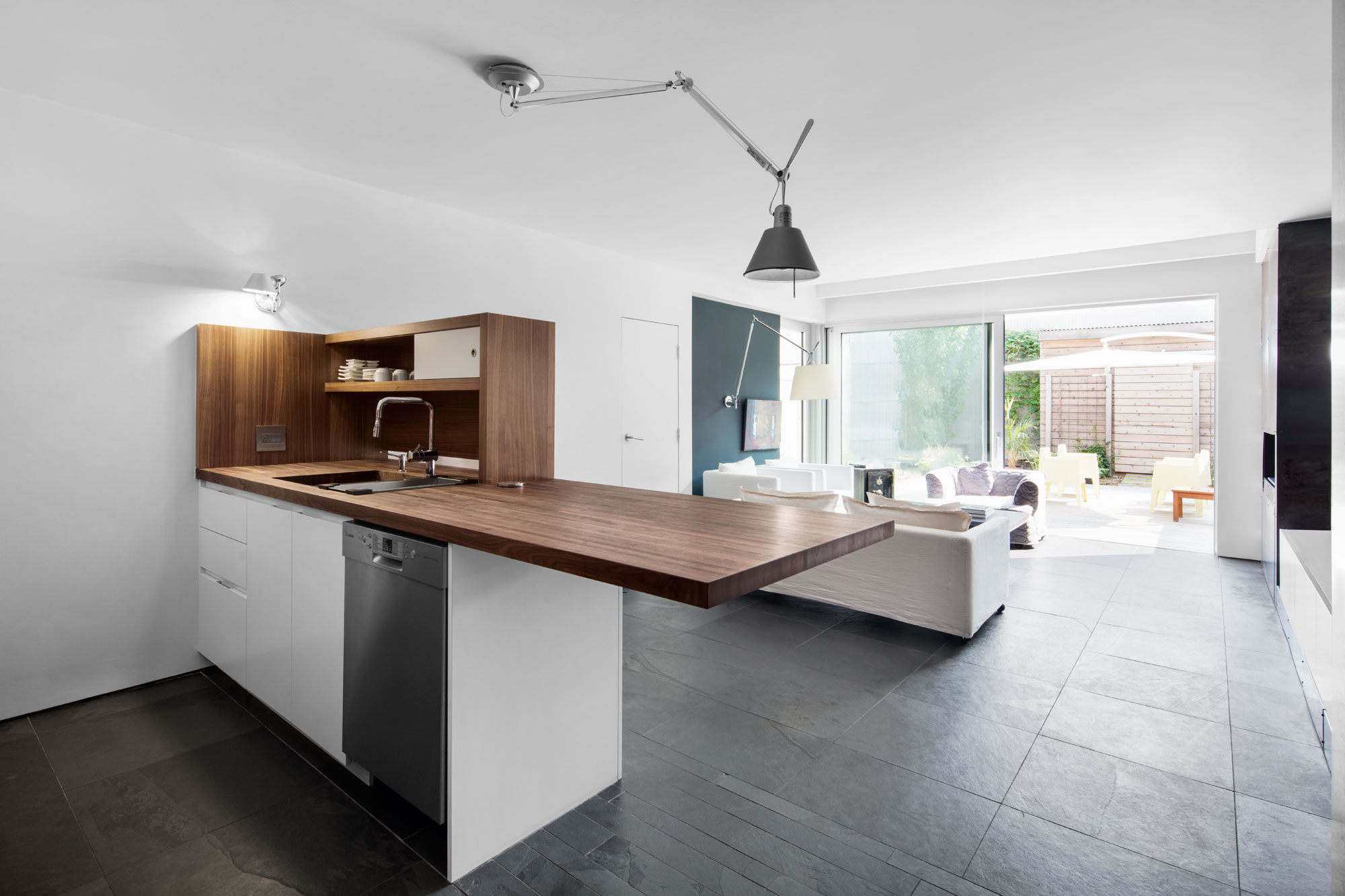 A Small Contemporary House with Bold Black Facade in Montréal by Architecture Open Form (7)