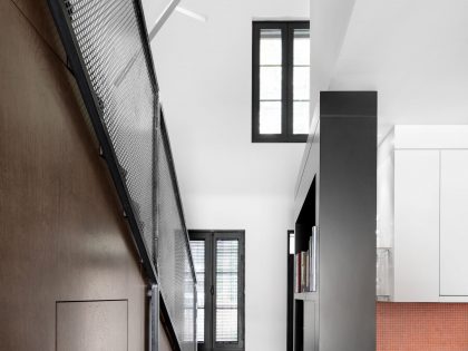 A Small Contemporary House with Bold Black Facade in Montréal by Architecture Open Form (8)