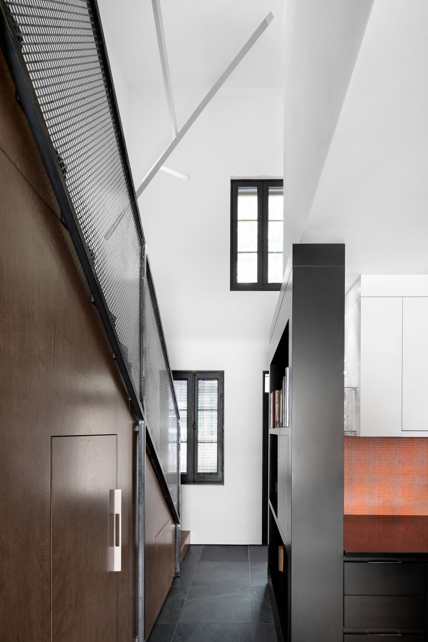 A Small Contemporary House with Bold Black Facade in Montréal by Architecture Open Form (8)