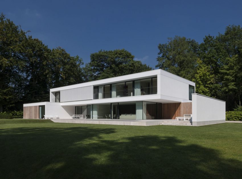 A Spacious Contemporary Home with a Large Floor-to-Ceiling Windows in Bruges by CUBYC architects (1)