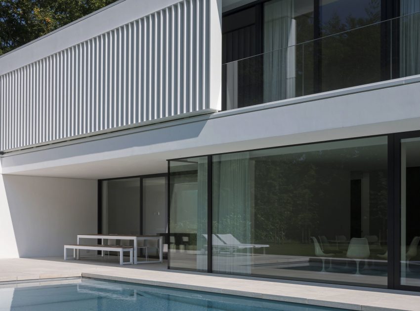 A Spacious Contemporary Home with a Large Floor-to-Ceiling Windows in Bruges by CUBYC architects (4)