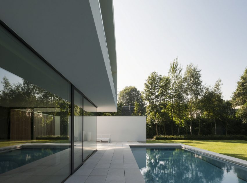 A Spacious Contemporary Home with a Large Floor-to-Ceiling Windows in Bruges by CUBYC architects (9)