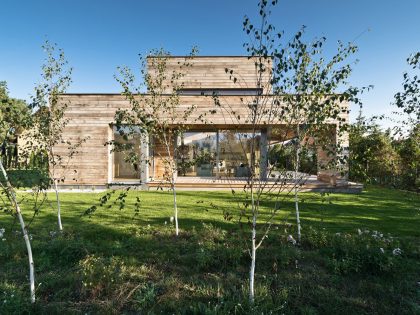 A Spacious Contemporary Wooden Home with Cedar Walls Inside and Out in Poznań by Mariusz Wrzeszcz Office (1)