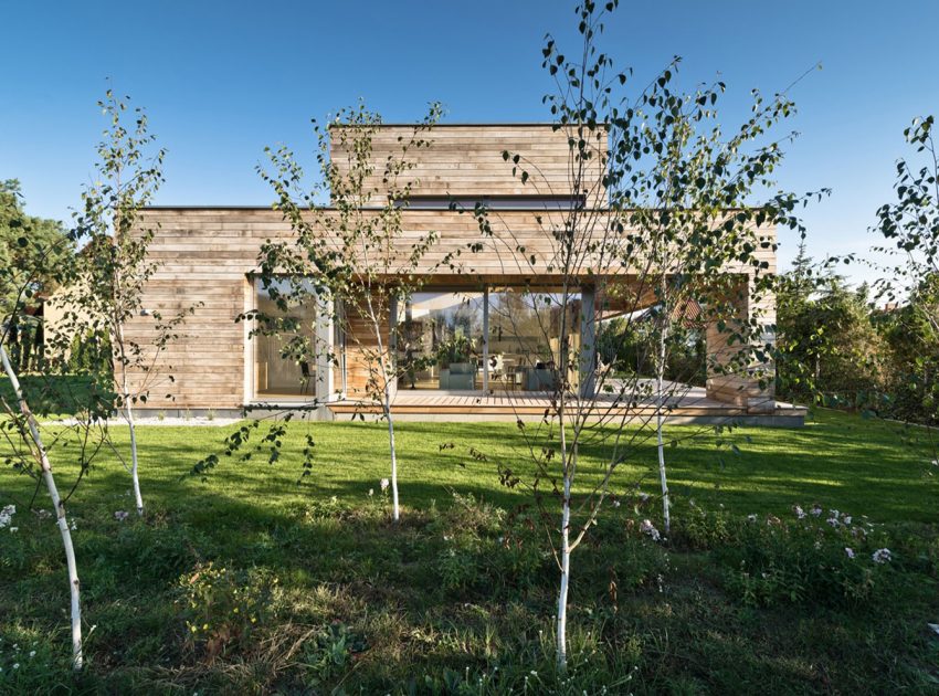 A Spacious Contemporary Wooden Home with Cedar Walls Inside and Out in Poznań by Mariusz Wrzeszcz Office (1)