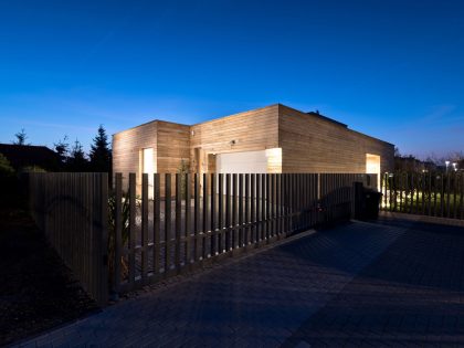 A Spacious Contemporary Wooden Home with Cedar Walls Inside and Out in Poznań by Mariusz Wrzeszcz Office (17)