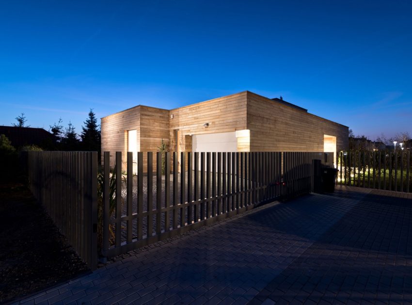 A Spacious Contemporary Wooden Home with Cedar Walls Inside and Out in Poznań by Mariusz Wrzeszcz Office (17)