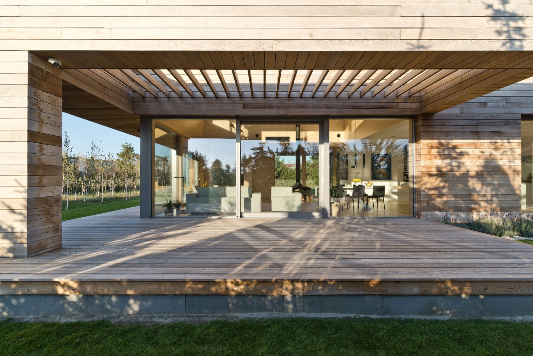 A Spacious Contemporary Wooden Home with Cedar Walls Inside and Out in Poznań by Mariusz Wrzeszcz Office (2)