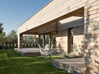 A Spacious Contemporary Wooden Home with Cedar Walls Inside and Out in Poznań by Mariusz Wrzeszcz Office (4)