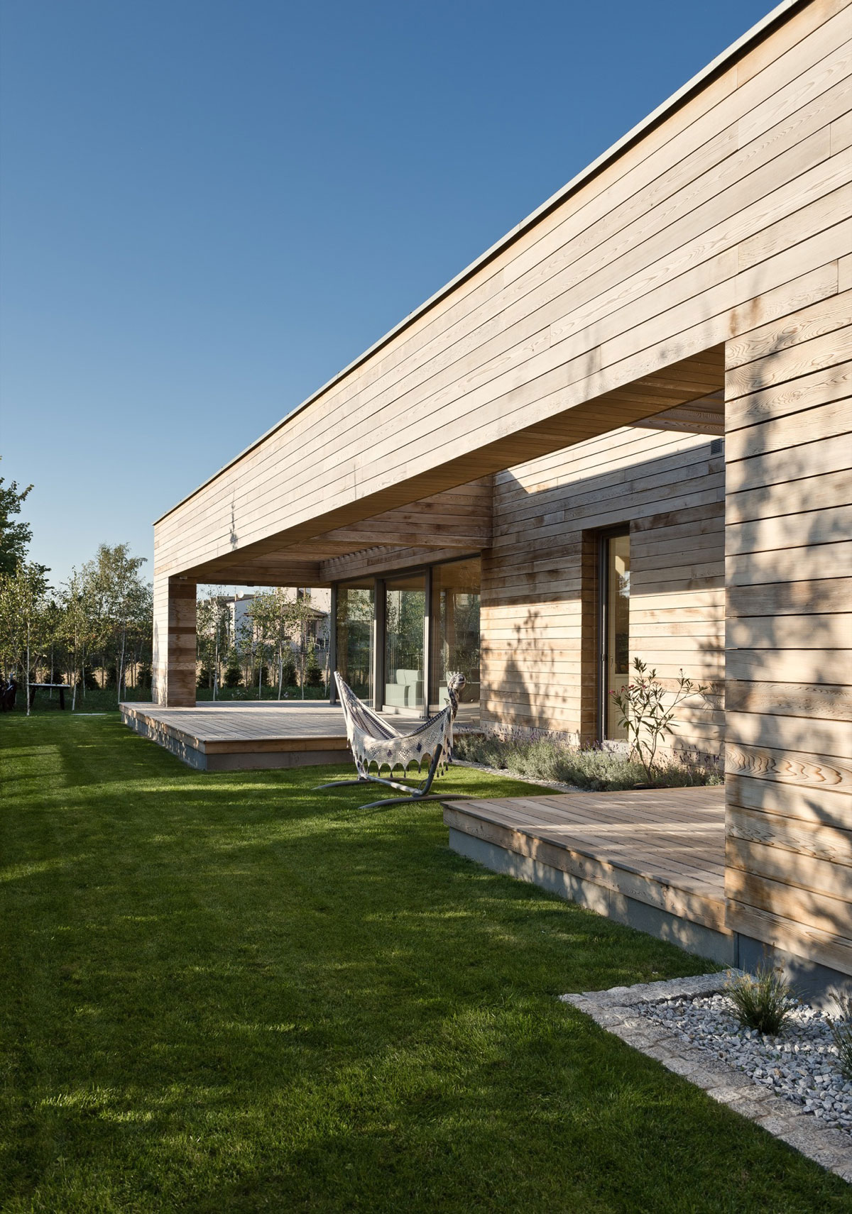 A Spacious Contemporary Wooden Home with Cedar Walls Inside and Out in Poznań by Mariusz Wrzeszcz Office (4)