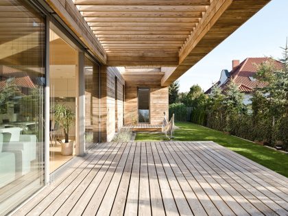 A Spacious Contemporary Wooden Home with Cedar Walls Inside and Out in Poznań by Mariusz Wrzeszcz Office (5)