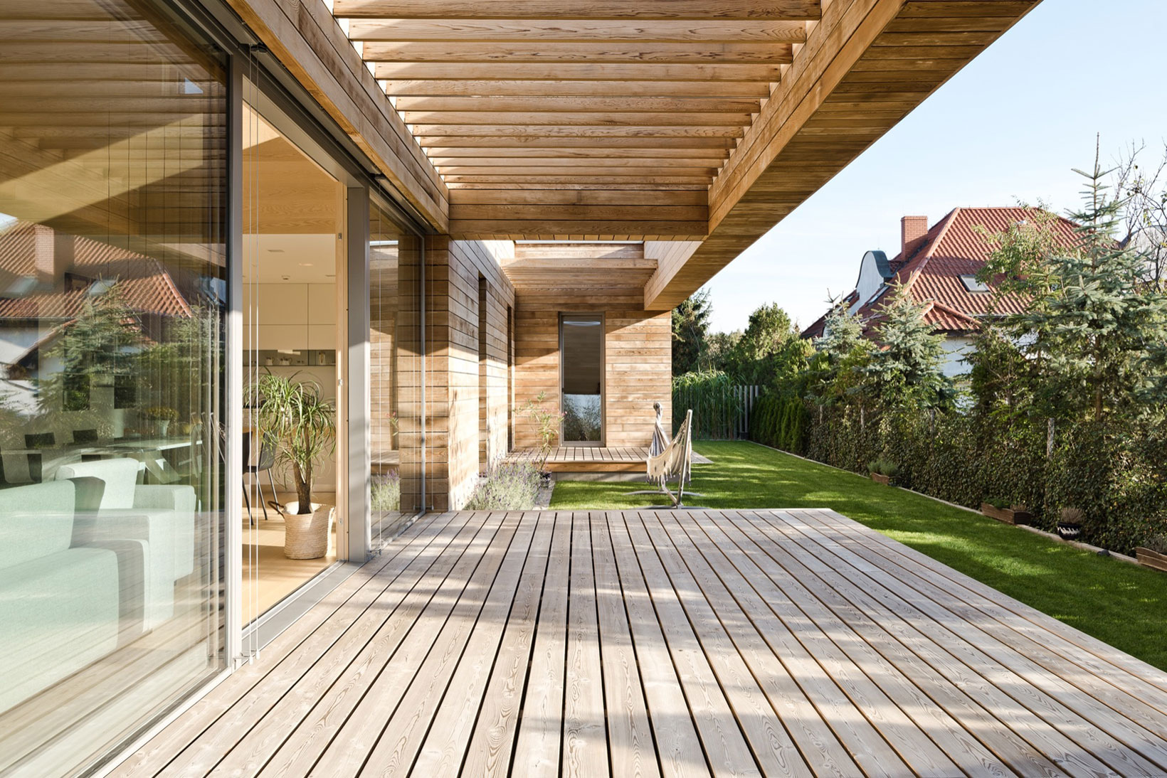 A Spacious Contemporary Wooden Home with Cedar Walls Inside and Out in Poznań by Mariusz Wrzeszcz Office (5)