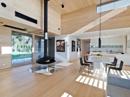 A Spacious Contemporary Wooden Home with Cedar Walls Inside and Out in Poznań by Mariusz Wrzeszcz Office (6)