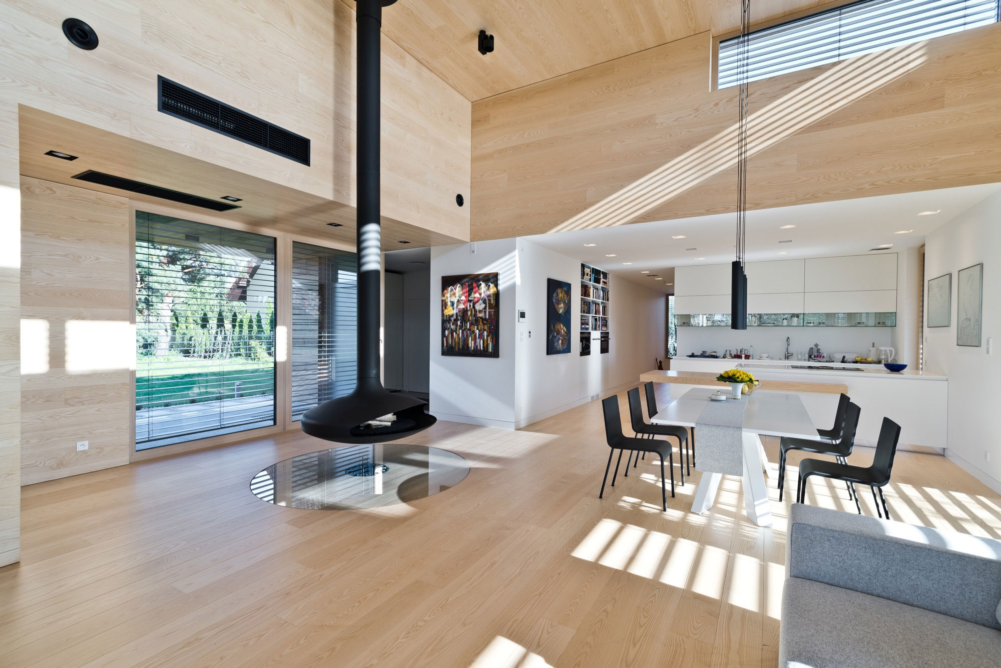 A Spacious Contemporary Wooden Home with Cedar Walls Inside and Out in Poznań by Mariusz Wrzeszcz Office (6)