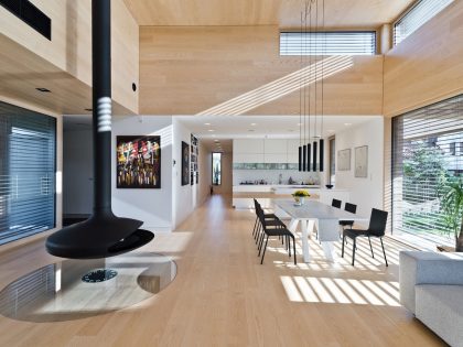 A Spacious Contemporary Wooden Home with Cedar Walls Inside and Out in Poznań by Mariusz Wrzeszcz Office (7)