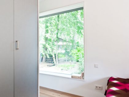 A Spacious Modern House with Floor-to-Ceiling Windows in the Woods of Potsdam, Germany by Claim (14)