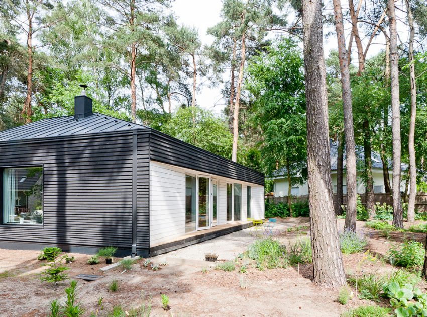 A Spacious Modern House with Floor-to-Ceiling Windows in the Woods of Potsdam, Germany by Claim (2)