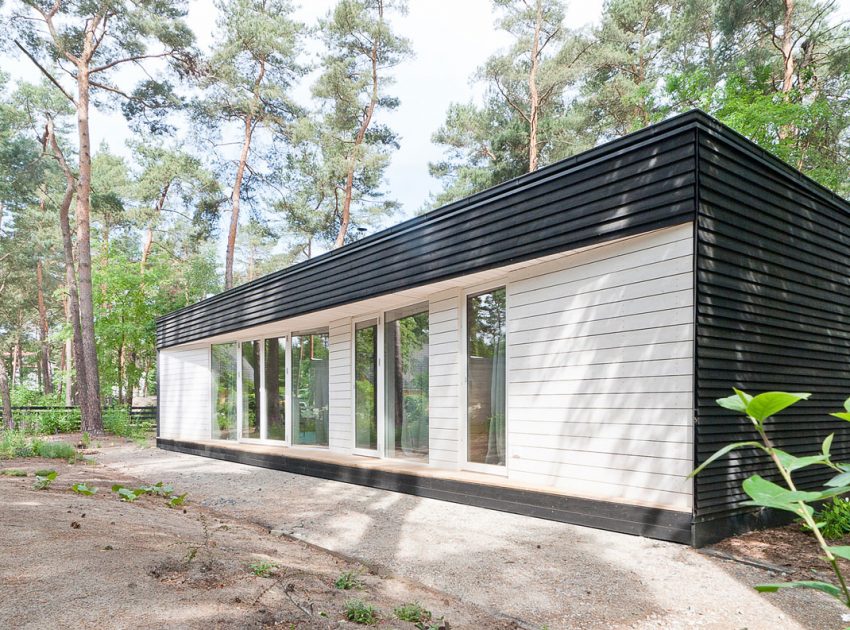 A Spacious Modern House with Floor-to-Ceiling Windows in the Woods of Potsdam, Germany by Claim (3)