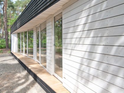 A Spacious Modern House with Floor-to-Ceiling Windows in the Woods of Potsdam, Germany by Claim (7)