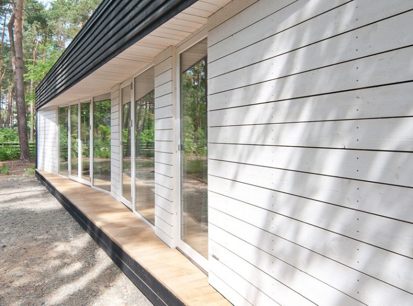 A Spacious Modern House with Floor-to-Ceiling Windows in the Woods of Potsdam, Germany by Claim (7)