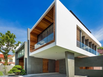 A Spacious Modern House with Wood and Orange Brick Walls in Singapore