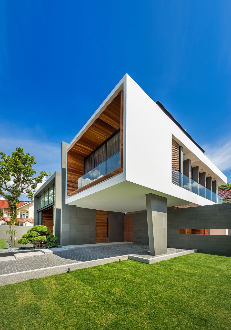 A Spacious Modern House with Wood and Orange Brick Walls in Singapore by Park + Associates Pte Ltd (2)