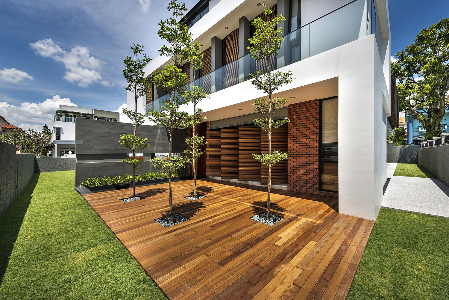 A Spacious Modern House with Wood and Orange Brick Walls in Singapore by Park + Associates Pte Ltd (3)