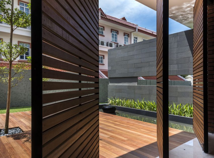 A Spacious Modern House with Wood and Orange Brick Walls in Singapore by Park + Associates Pte Ltd (9)