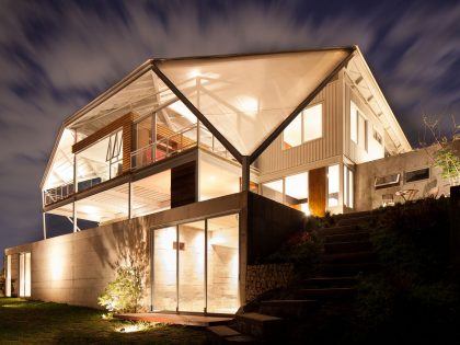 A Spacious and Airy House with a Sculptural Roof and Terraces in El Salvador by Cincopatasalgato (13)