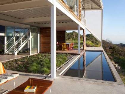 A Spacious and Airy House with a Sculptural Roof and Terraces in El Salvador by Cincopatasalgato (4)