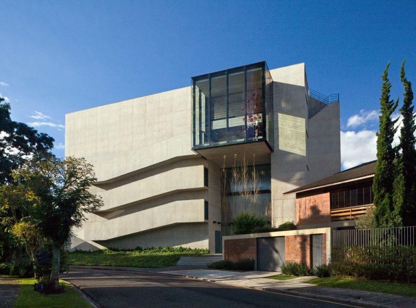 A Spacious and Stylish Contemporary Home for a Couple and Two Girls in Curitiba by Marcos Bertoldi Arquitetos (1)