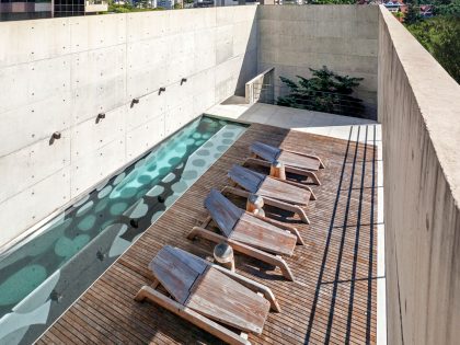 A Spacious and Stylish Contemporary Home for a Couple and Two Girls in Curitiba by Marcos Bertoldi Arquitetos (4)