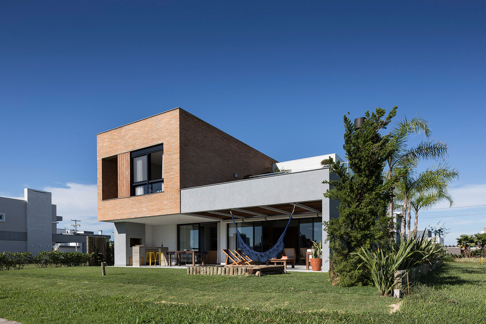 A Spacious and Warm Contemporary Home for a Young Family with Two Children in Xangri-lá, Brazil by Seferin Arquitetura (2)