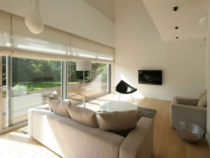 A Spacious and Warm House with High Ceilings and Plenty of Natural Light in Wroclaw, Poland by KameleonLab (9)