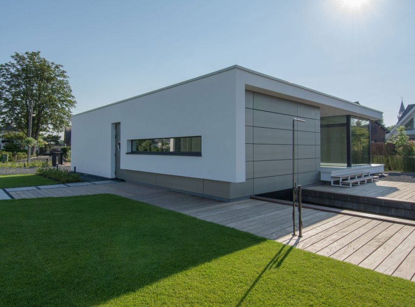 A Striking Contemporary Home with Curved Glass Walls on the Shores of the Reeuwijkse Plassen by Lab32 architecten (10)