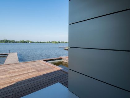 A Striking Contemporary Home with Curved Glass Walls on the Shores of the Reeuwijkse Plassen by Lab32 architecten (15)