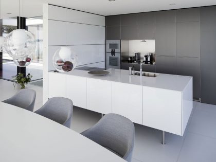 A Striking Contemporary Home with Curved Glass Walls on the Shores of the Reeuwijkse Plassen by Lab32 architecten (18)