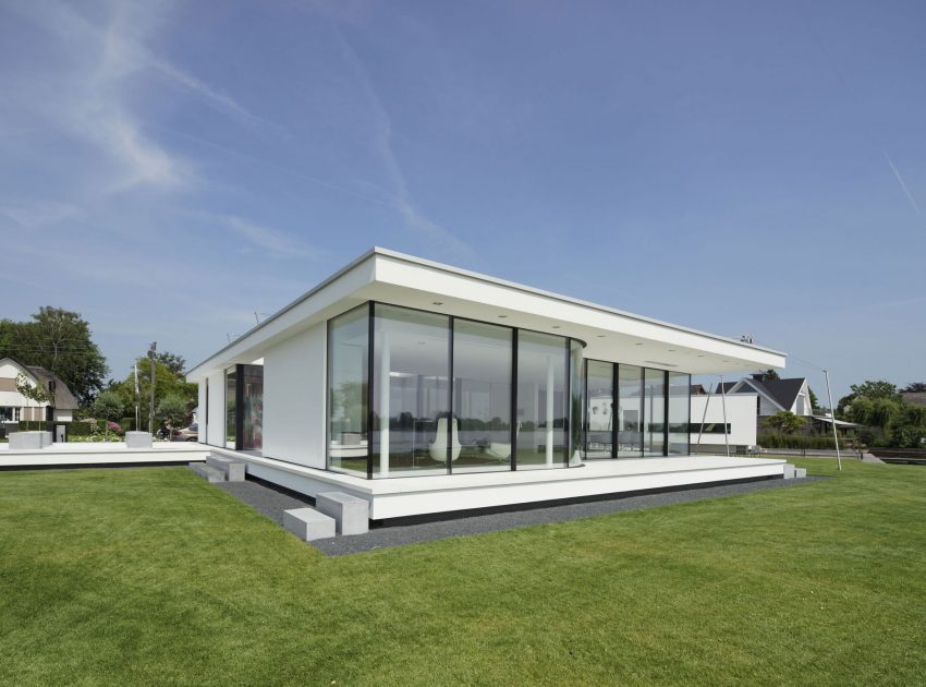 A Striking Contemporary Home with Curved Glass Walls on the Shores of the Reeuwijkse Plassen by Lab32 architecten (2)