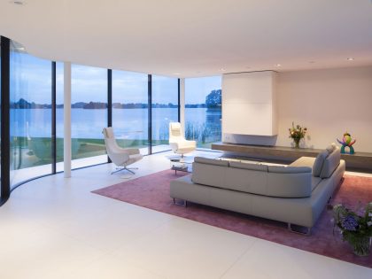 A Striking Contemporary Home with Curved Glass Walls on the Shores of the Reeuwijkse Plassen by Lab32 architecten (28)