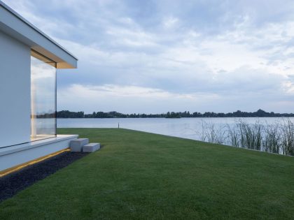 A Striking Contemporary Home with Curved Glass Walls on the Shores of the Reeuwijkse Plassen by Lab32 architecten (29)