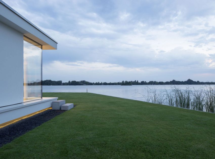 A Striking Contemporary Home with Curved Glass Walls on the Shores of the Reeuwijkse Plassen by Lab32 architecten (29)