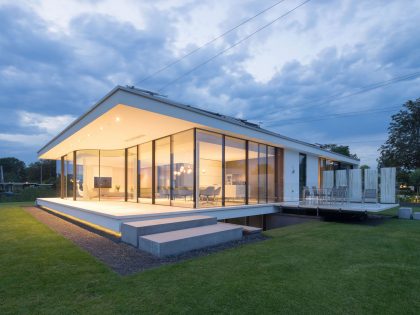 A Striking Contemporary Home with Curved Glass Walls on the Shores of the Reeuwijkse Plassen by Lab32 architecten (31)