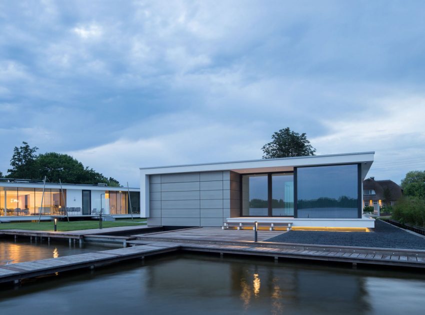 A Striking Contemporary Home with Curved Glass Walls on the Shores of the Reeuwijkse Plassen by Lab32 architecten (32)