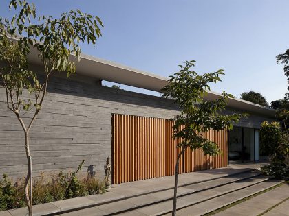 A Striking Modern Home Composed of Concrete and Glass Structure in Tel Aviv by Pitsou Kedem Architects (2)